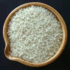 Premium Indian basmati long grain white rice in wooden bowl, wholesale